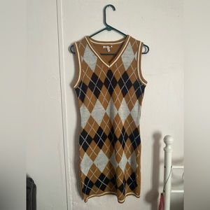 Dark tan checkerboard print dress. Mid length in size adult small.